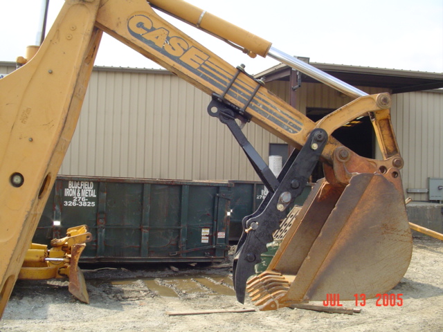 Case 580 k,l,m with pin on backhoe thumb